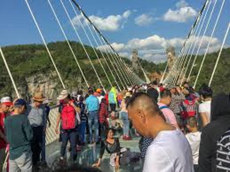 People walking on the Zhangjiajie Glass Bridge