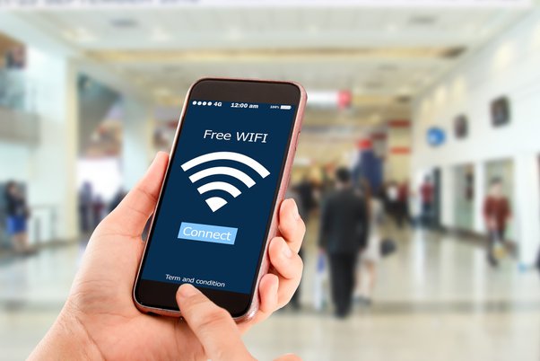 How do I connect to free WiFi at the airport?