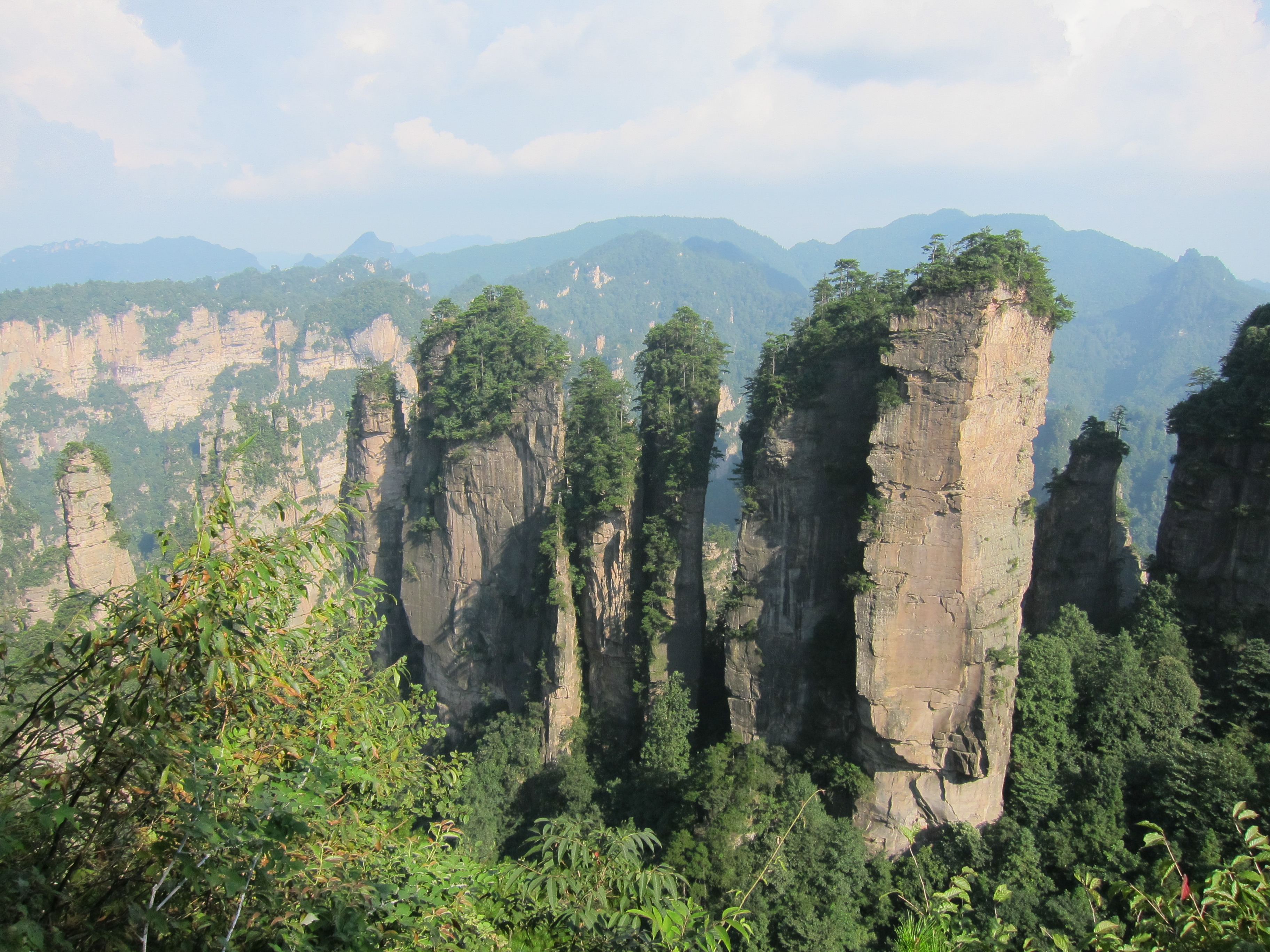 How many people live in Zhangjiajie?